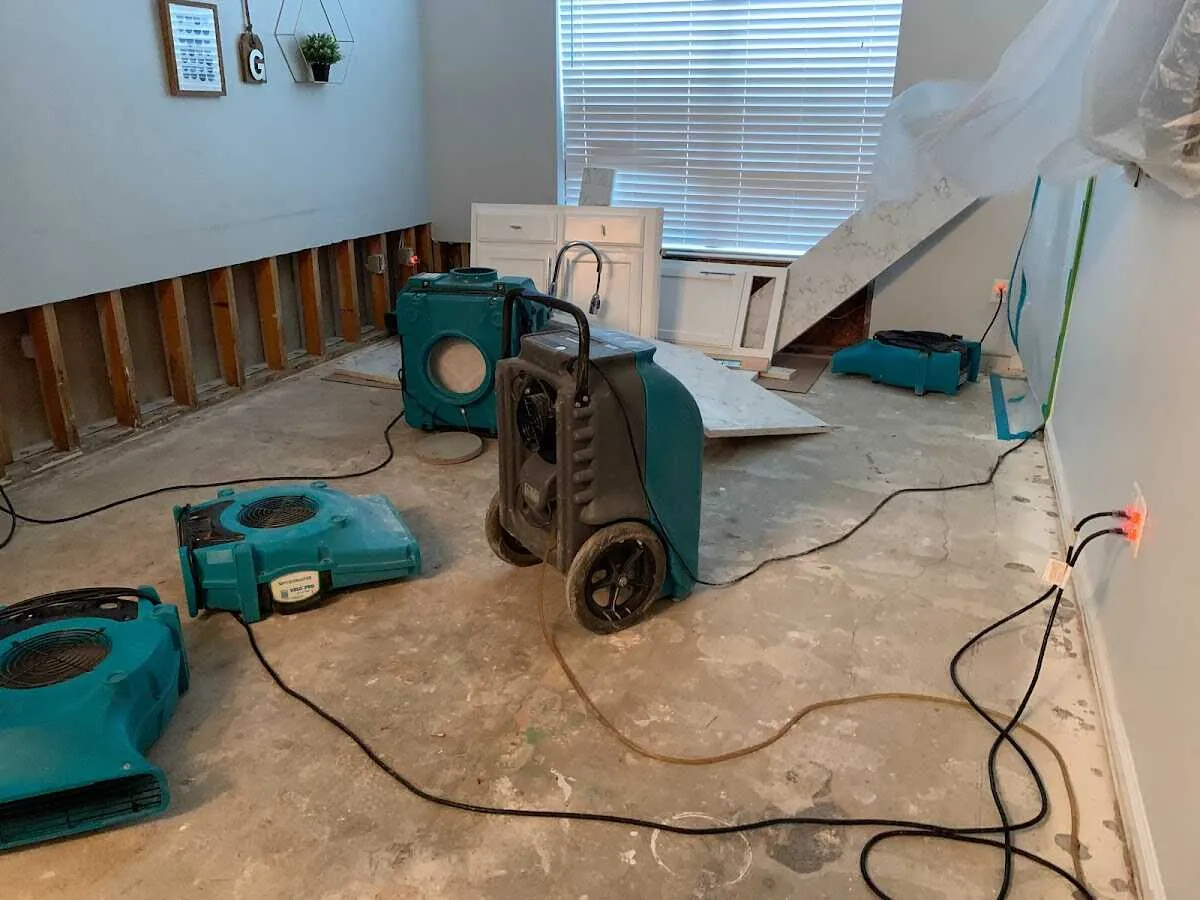 Dehumidifier in flood-cut room for Water Damage Restoration in Wakefield